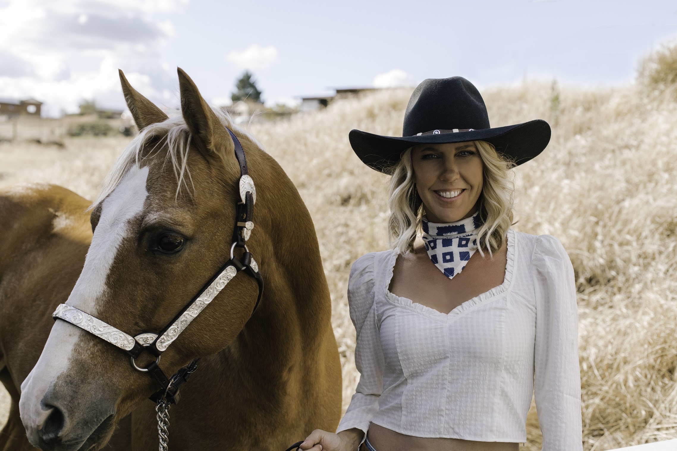Gretchen Fox Palmer with horse at Kenshō Stables, Texas Hill Country