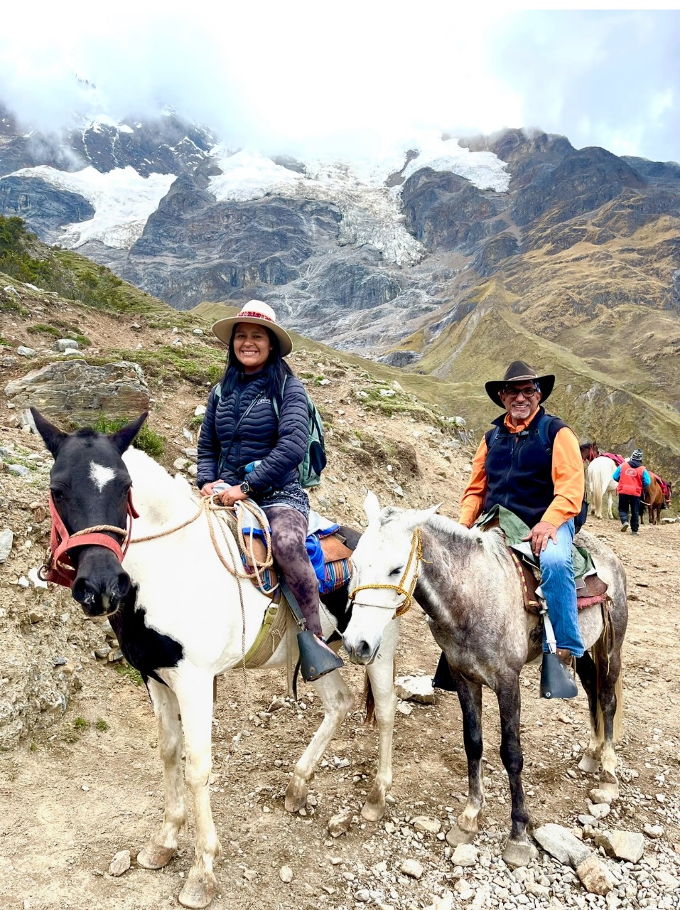 Daniel and Yanet on horseback in the Andes, Sacred Valley Peru