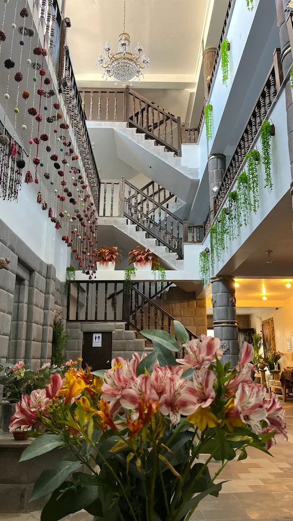 Tranquility Hotel lobby with fresh flowers and artisan details, Pisac, Peru